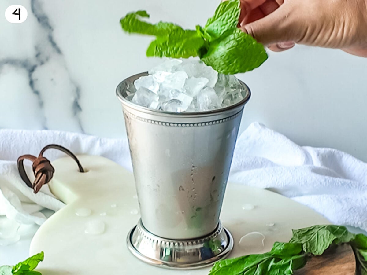 step 4 photo showing the Mint Julep being garnished with a mint sprig