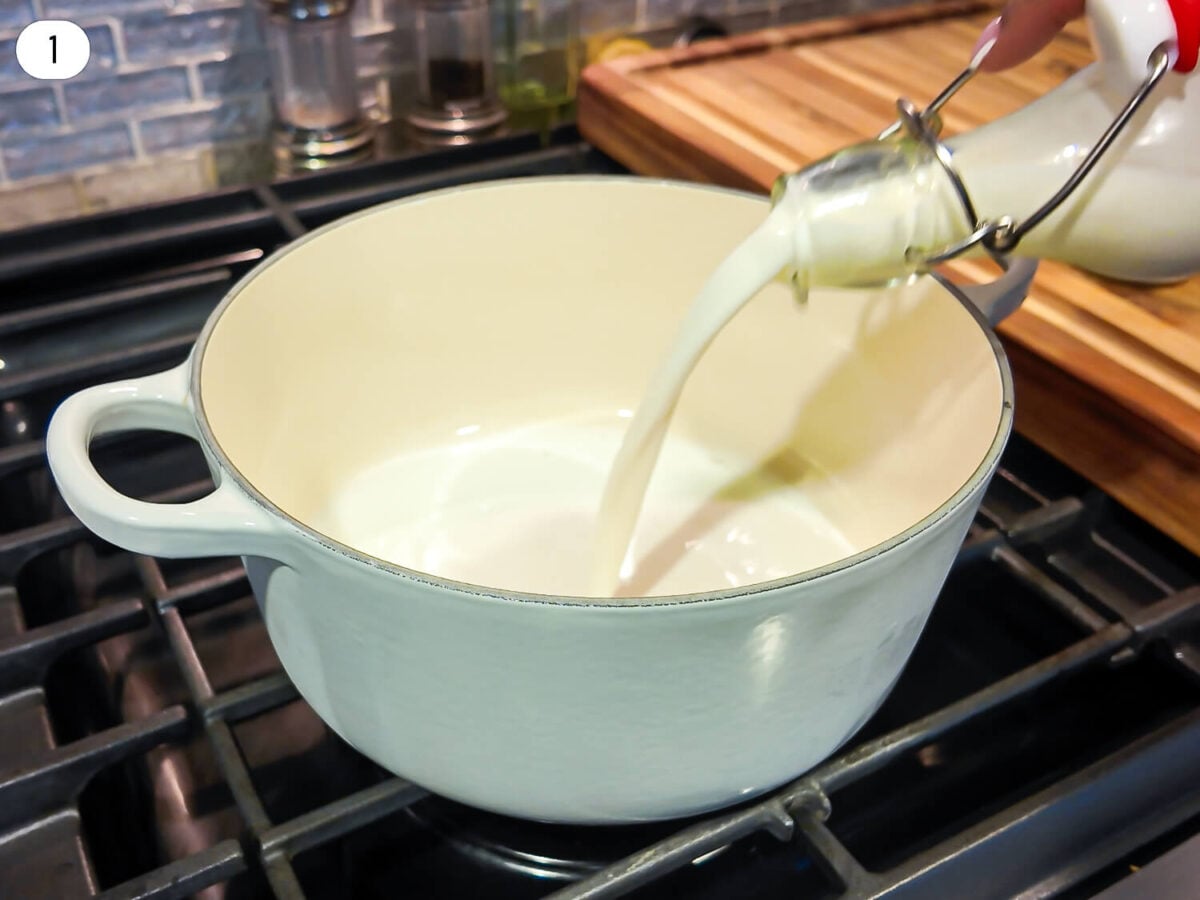 step one photo of adding heavy cream to the pot