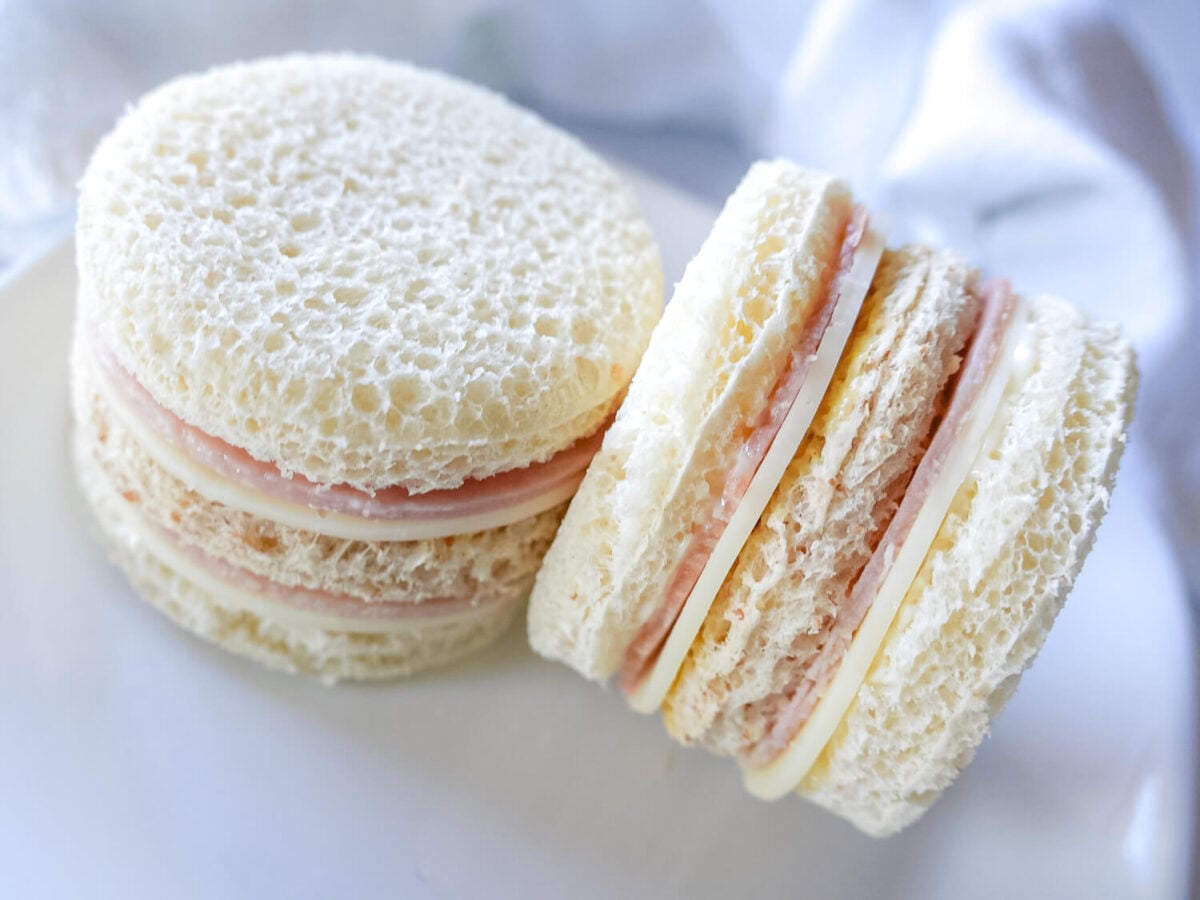 top down photo of Ham & Cheese Tea Sandwiches on a plate