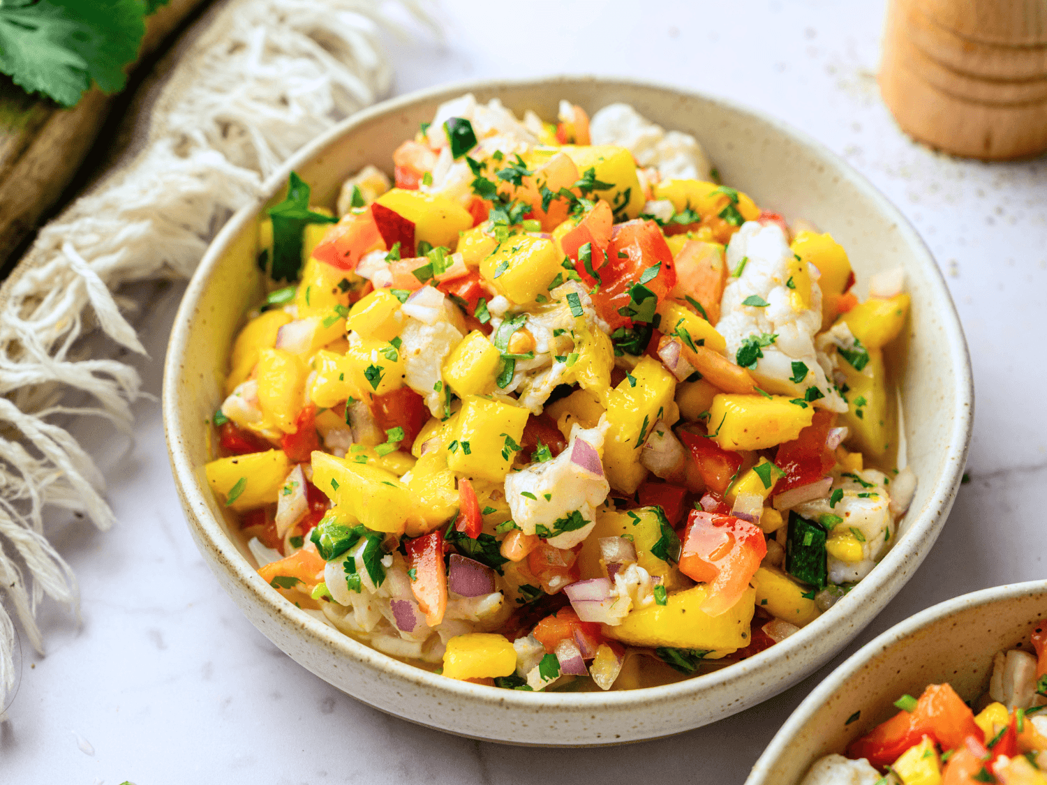 HERO side view of mango ceviche in a bowl