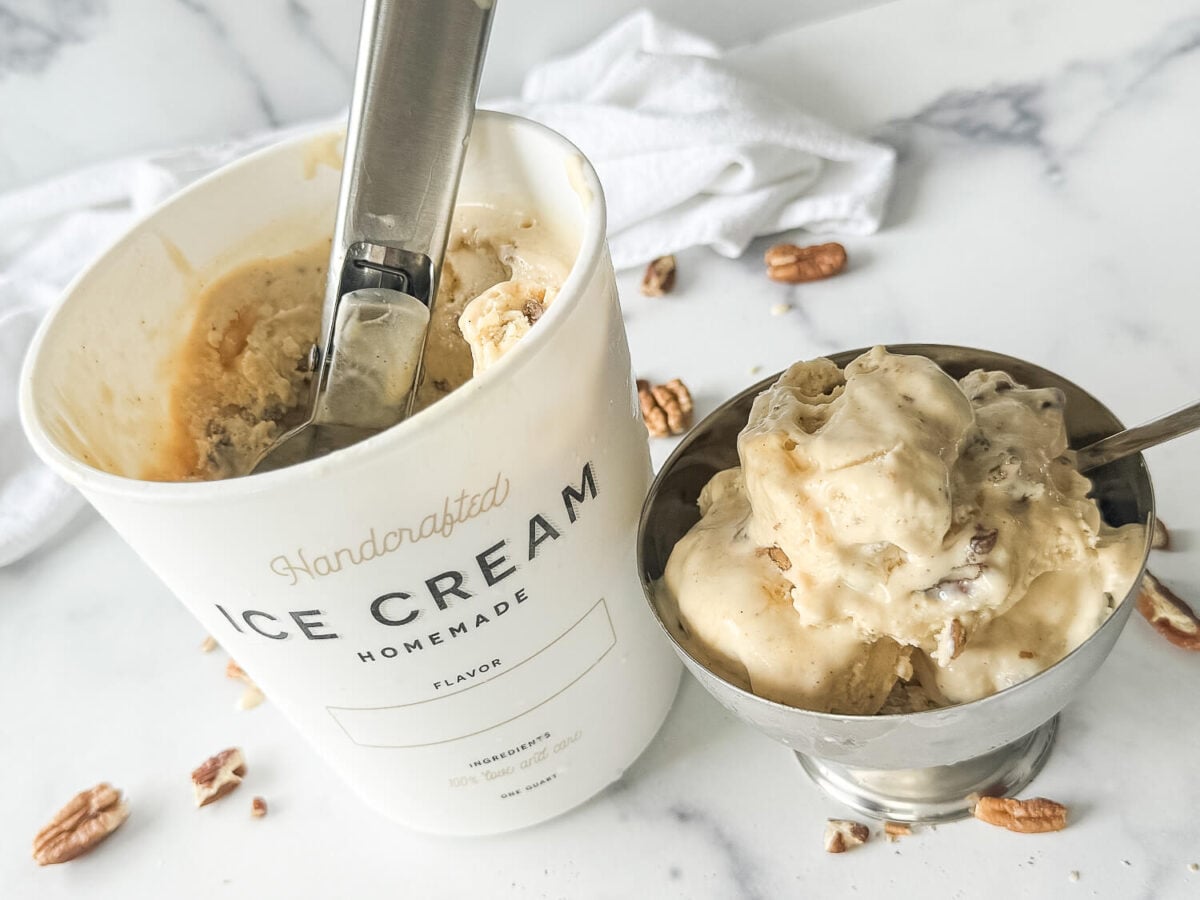 Photo of praline ice cream next to a tub of ice cream