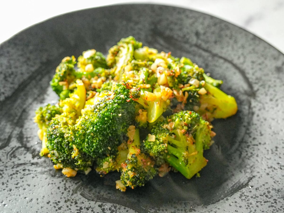 photo of Sautéed Broccoli on a black plate