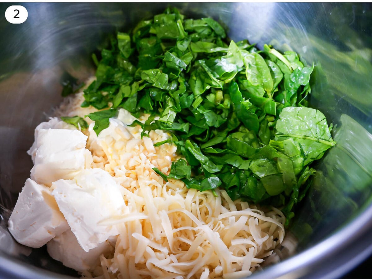 step 2 photo of Crockpot Spinach and Artichoke Dip ingredients inside the crockpot