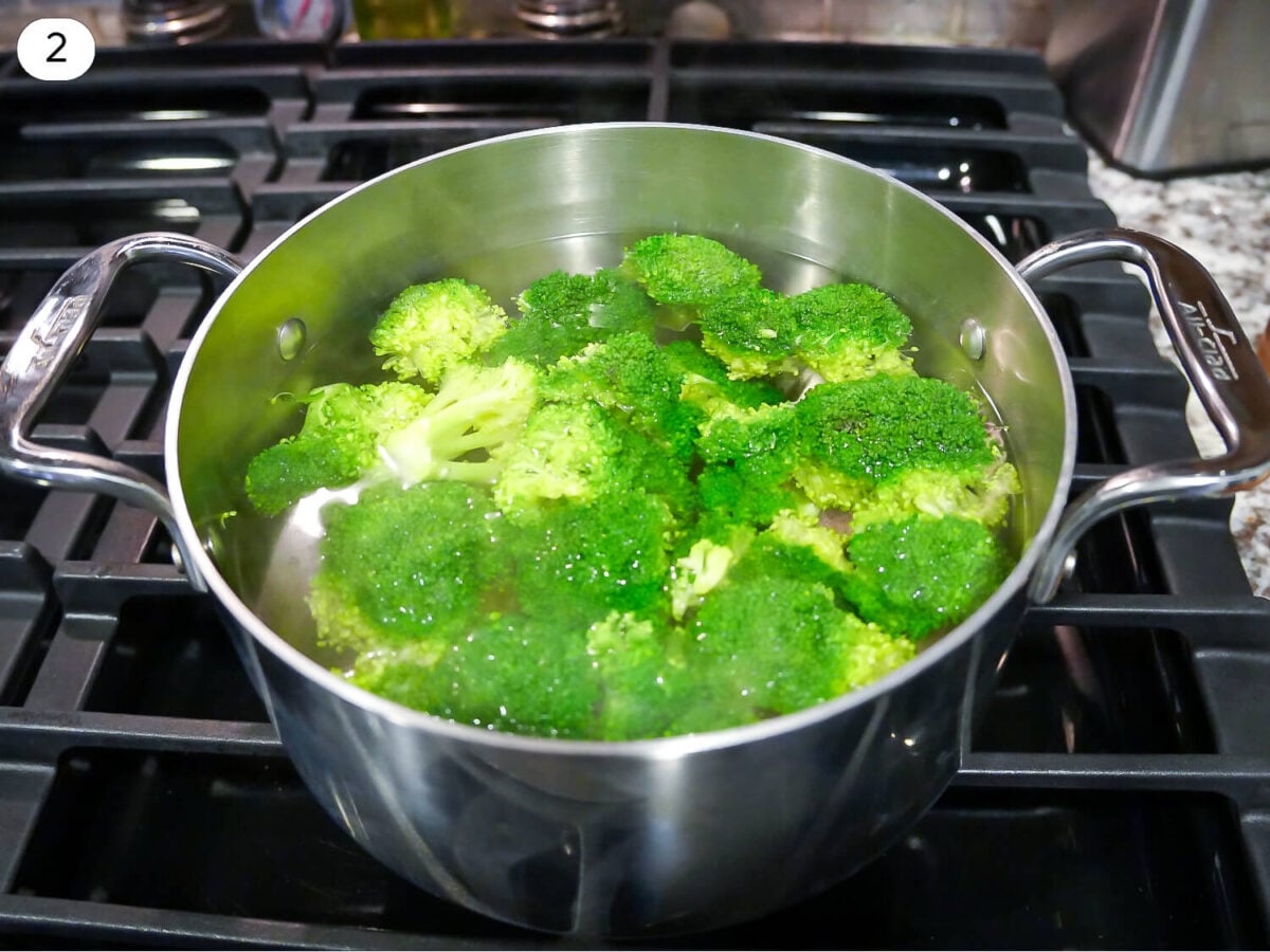 step 2 photo of broccoli being blanched in water