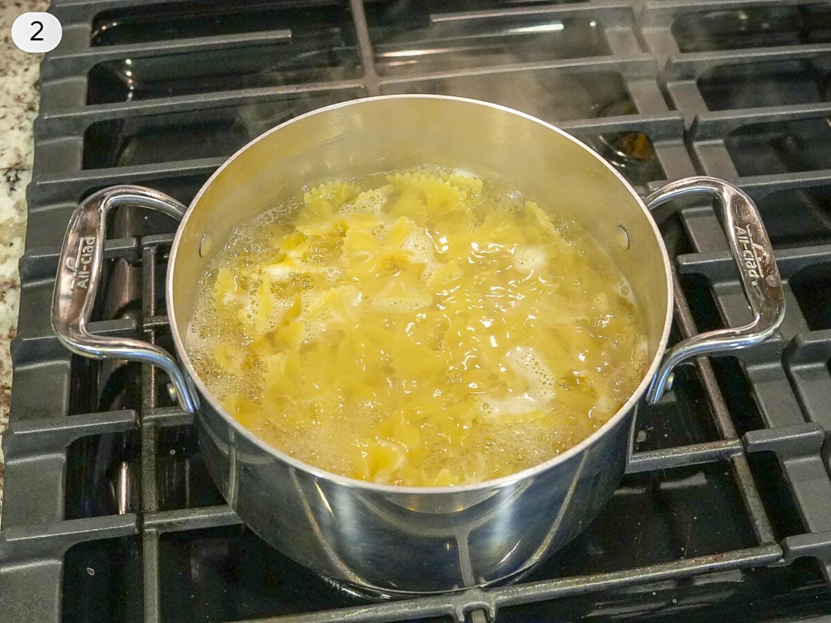 step 2 photo of pasta cooking in boiling water