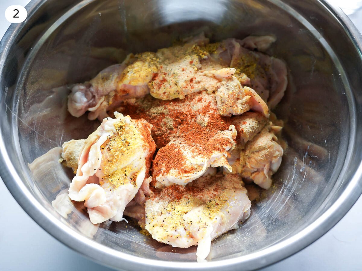 step 2 photo of seasoned chicken in a bowl