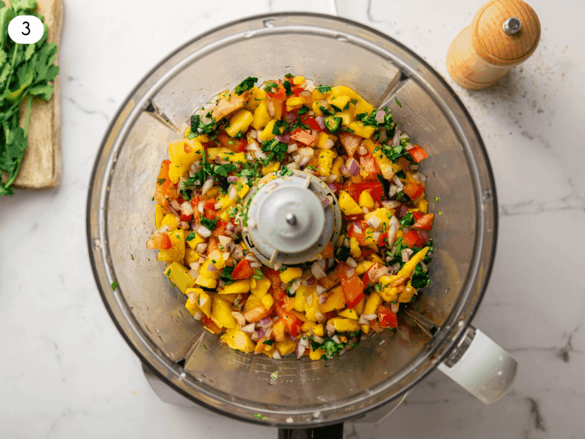 step 3 photo showing fruits and vegetables after being blended in a food processor