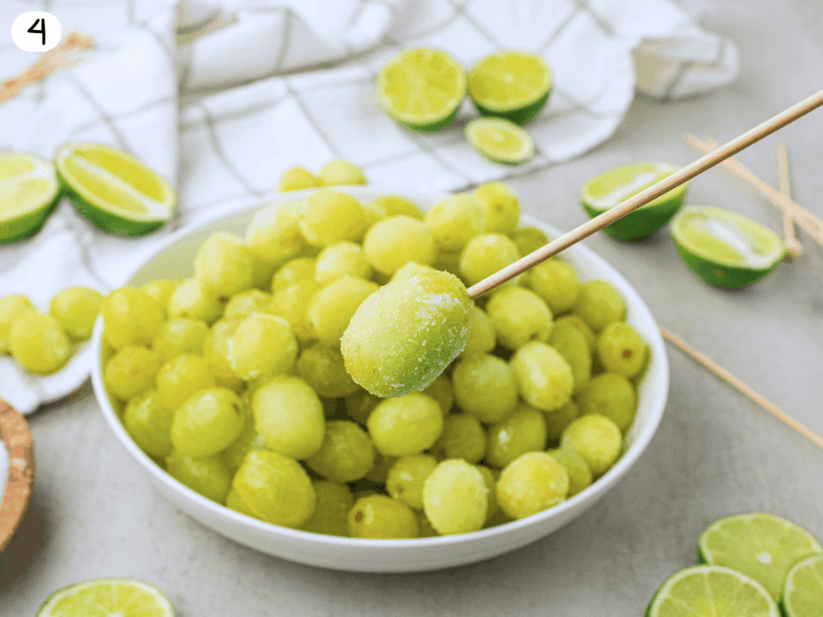 step 4 photo showing grapes on a skewer after they come out of the freezer