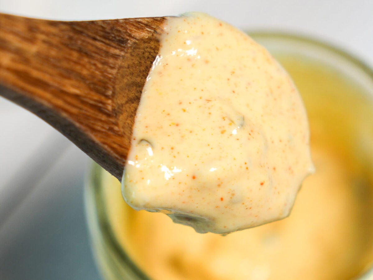 close up photo of Copycat Big Mac Sauce on a wooden spoon