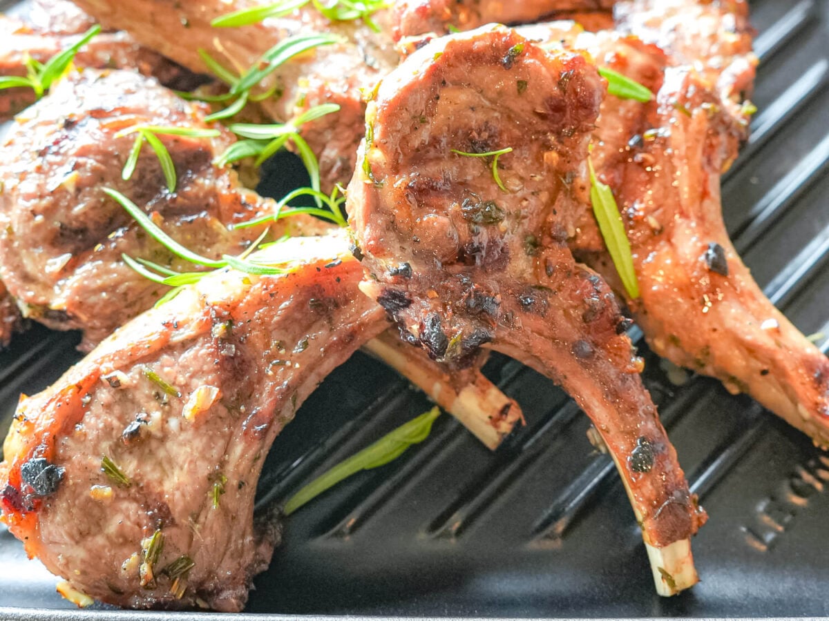 close up photo of cooked grilled lamb chops