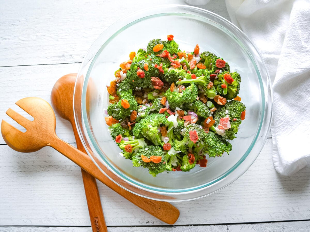 overhead photo of broccoli salad with bacon in a glass bowl