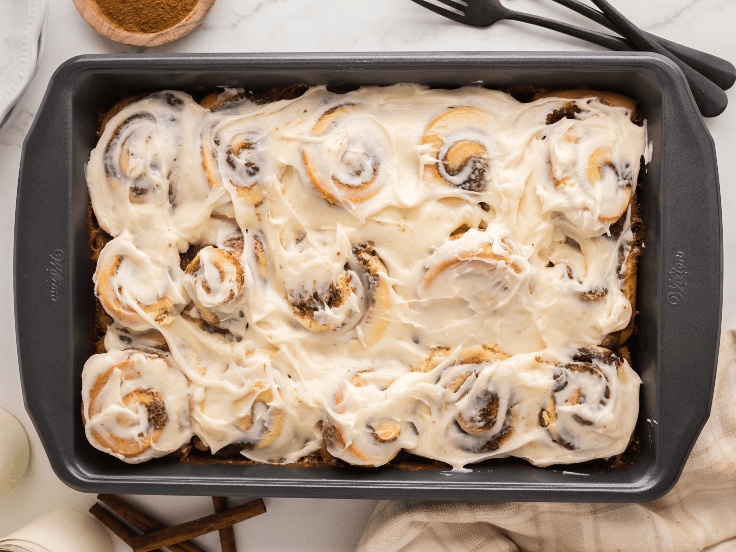 HERO photo of classic baked cinnamon rolls made with heavy cream