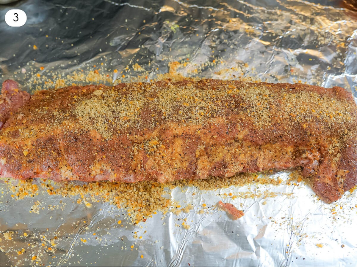 STEP 3 photo showing the Seasoning being added to the ribs