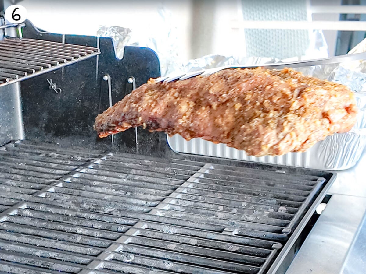 STEP 6 photo the ribs cooking on the grill