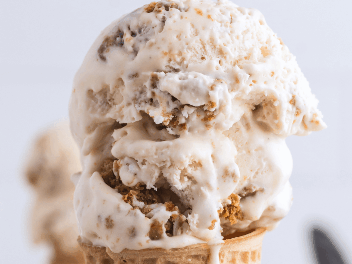 close up photo showing Oatmeal Cream Pie Ice Cream on an ice cream cone