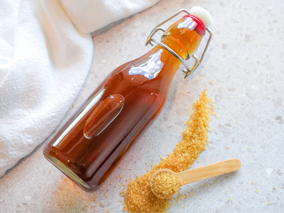 photo of Demerara Syrup next to a spoon of Demerara Sugar