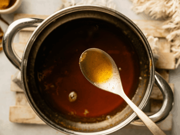 photo of Pumpkin Spice Syrup in a silver spoon