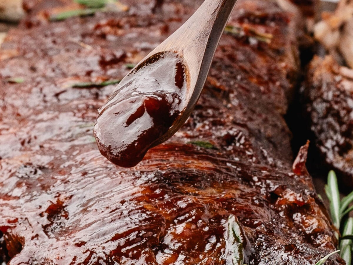 photo of bbq sauce dripping onto ribs