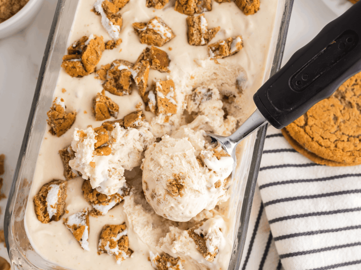 photo showing oatmeal cream pie ice cream being scooped out of a glass container