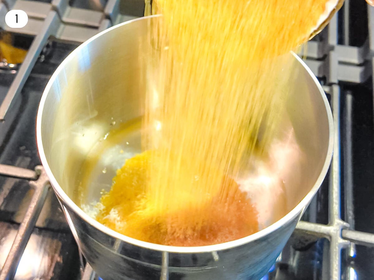 step 1 photo of Demerara Sugar being poured into a sauce pan of warm water