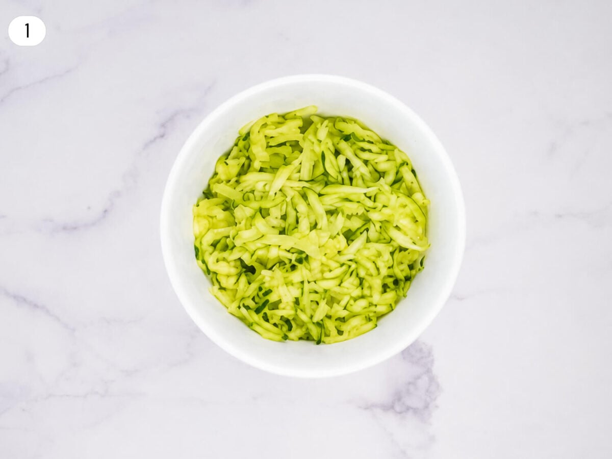 step 1 photo showing grated Zucchini