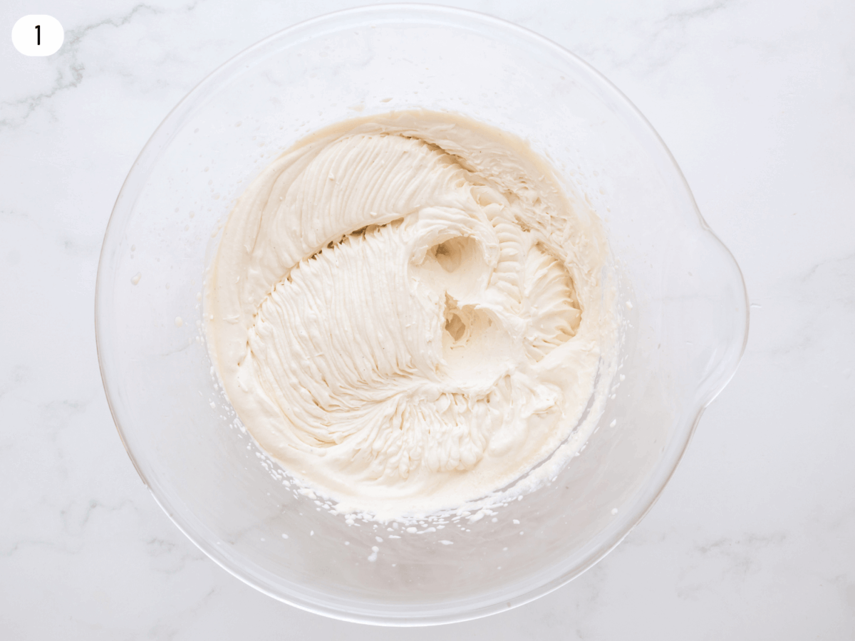 step 1 photo showing whipped cream with stiff peaks