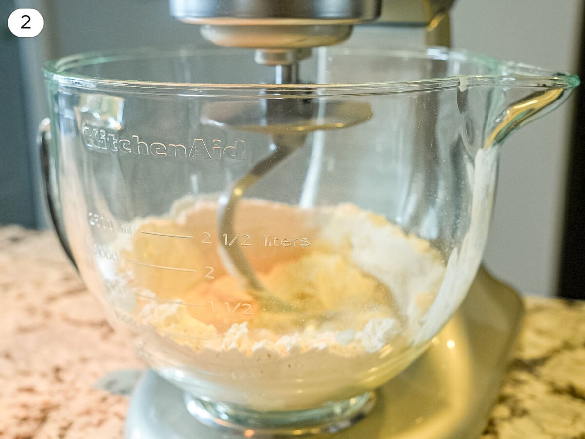 step 2 photo of ingredients mixing together in a mixer