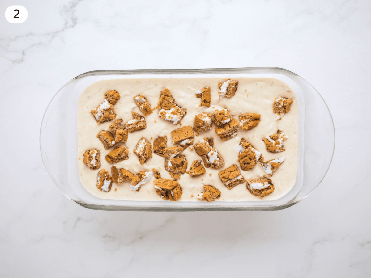 step 2 photo showing oatmeal cream pies broken up into ice cream mixture
