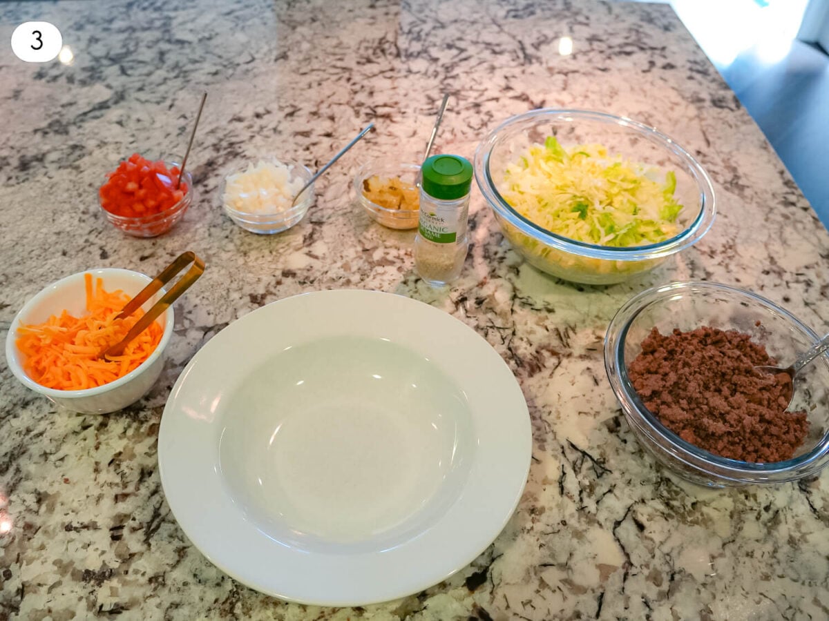 step 3 photo of gathering ingredients to assemble the salad