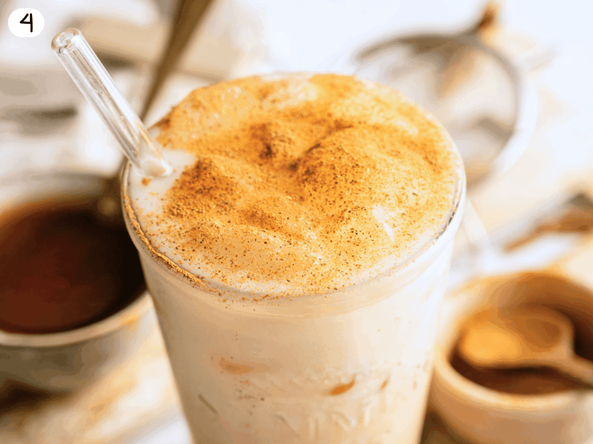 step 4 photo showing pumpkin cream chai with cold foam on top and cinnamon garnish
