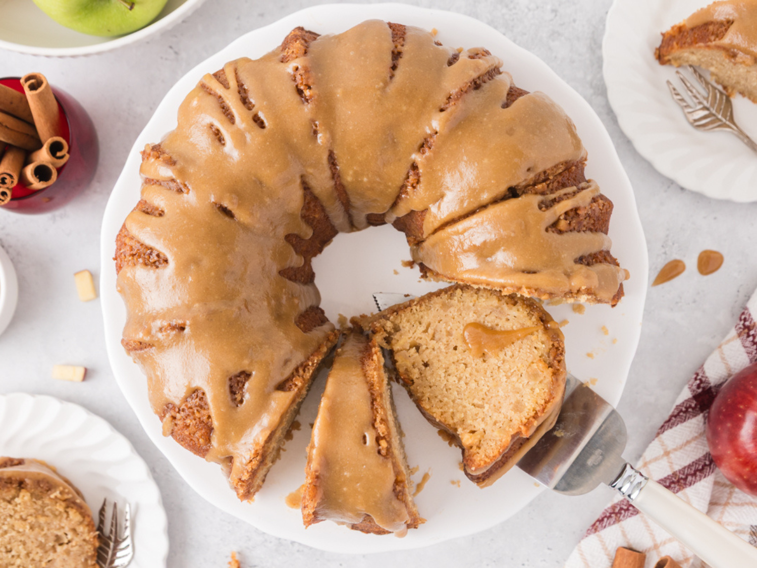 HERO photo of an overhead shot of apple bundt cake that's sliced open