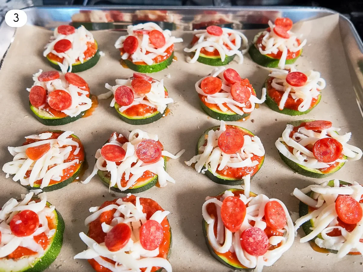 step 3 photo showing toppings that were added to the zucchini slices