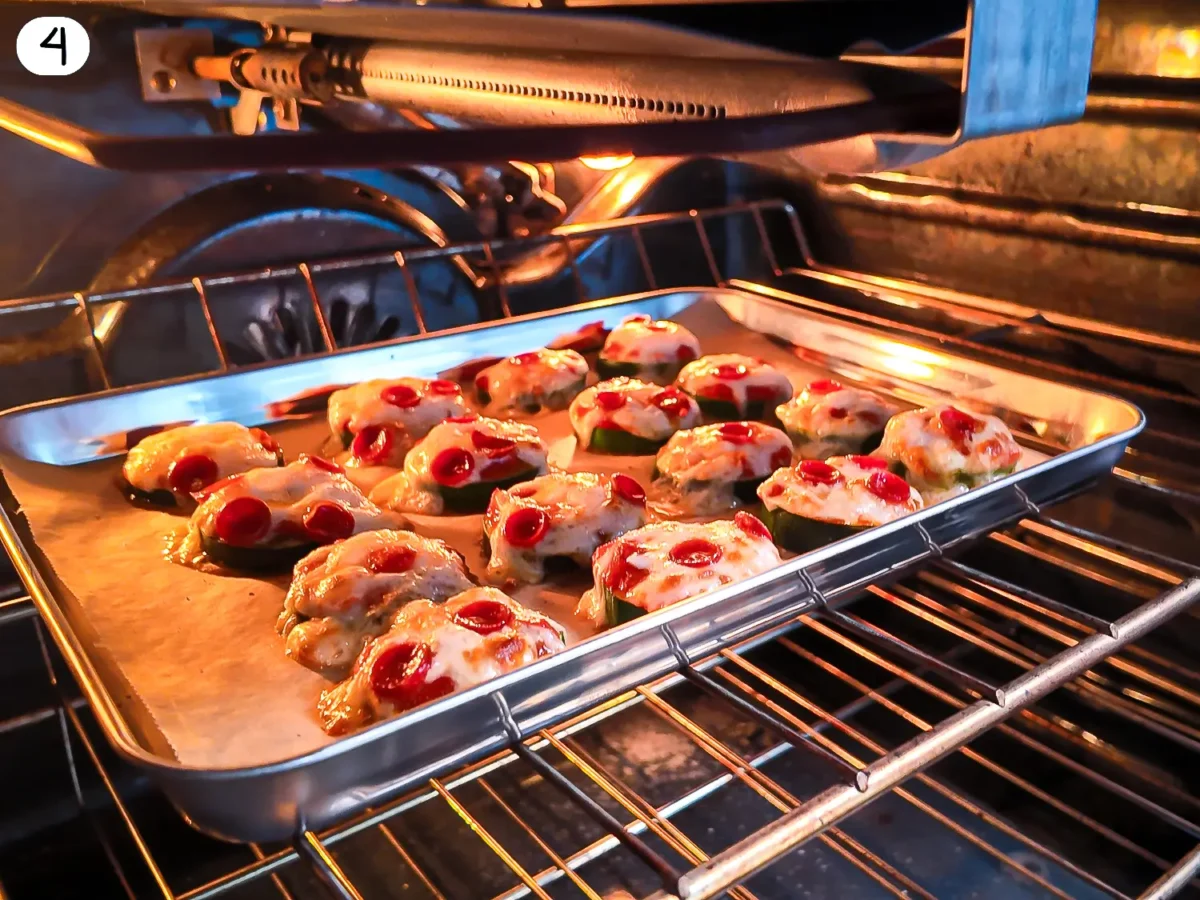 step 4 photo showing zucchini slices baking in the oven