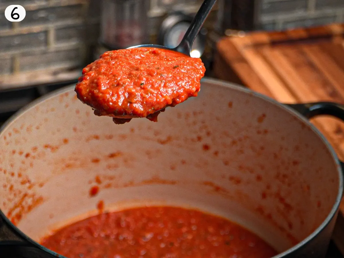 step 6 photo showing pureed sauce on a spoon