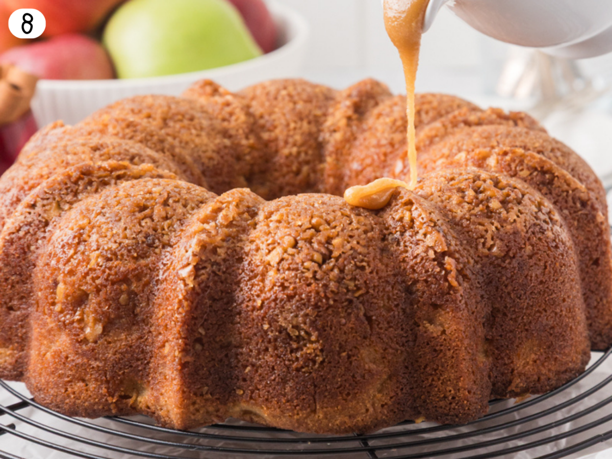 step 8 photo showing a backed apple bundt cake with caramel drizzle icing being added