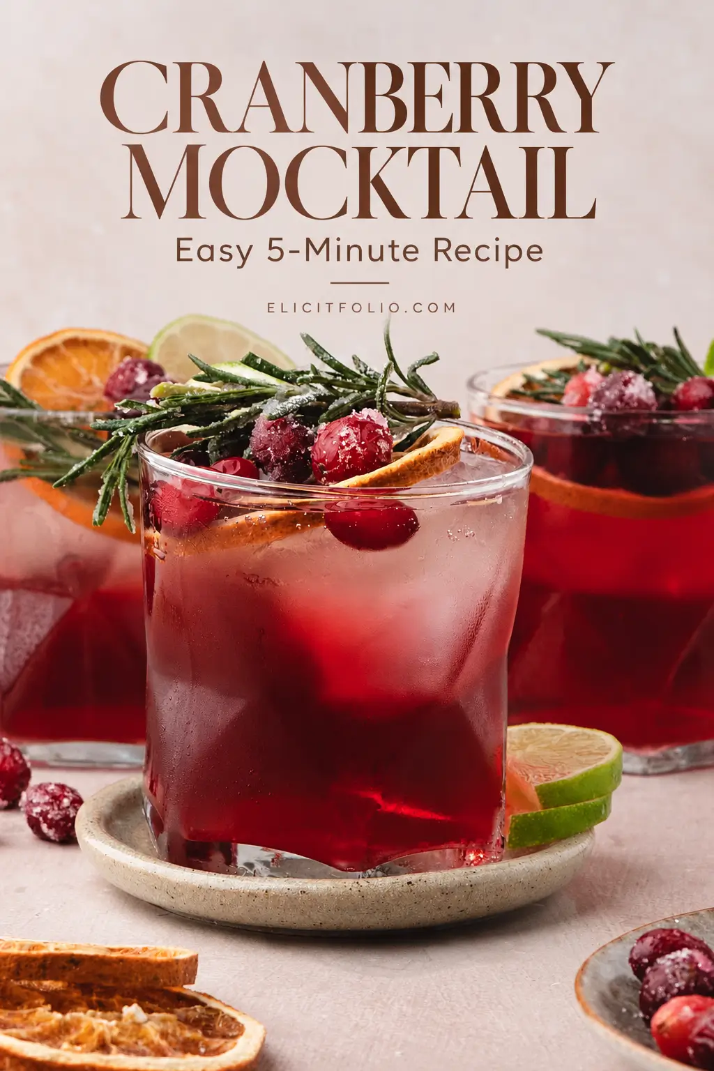Pinterest graphic featuring a cranberry mocktail garnished with sugared cranberries, citrus, and rosemary, with text reading “Cranberry Mocktail: Easy 5-Minute Recipe