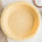 HERO photo of crisco pie crust in a pie dish