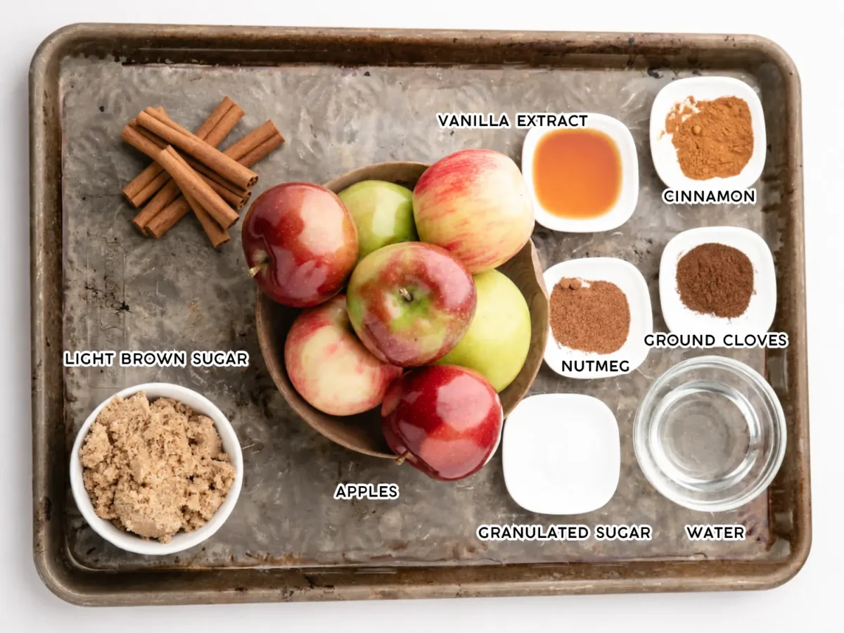 overhead flat lay photo of slow cooker apple butter ingredients