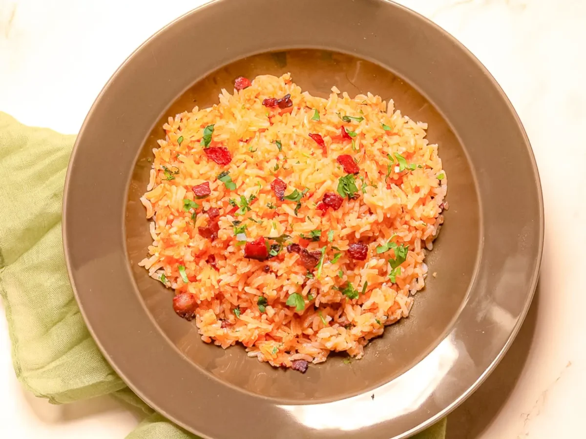 overhead photo of charleston red rice on a gray bowl