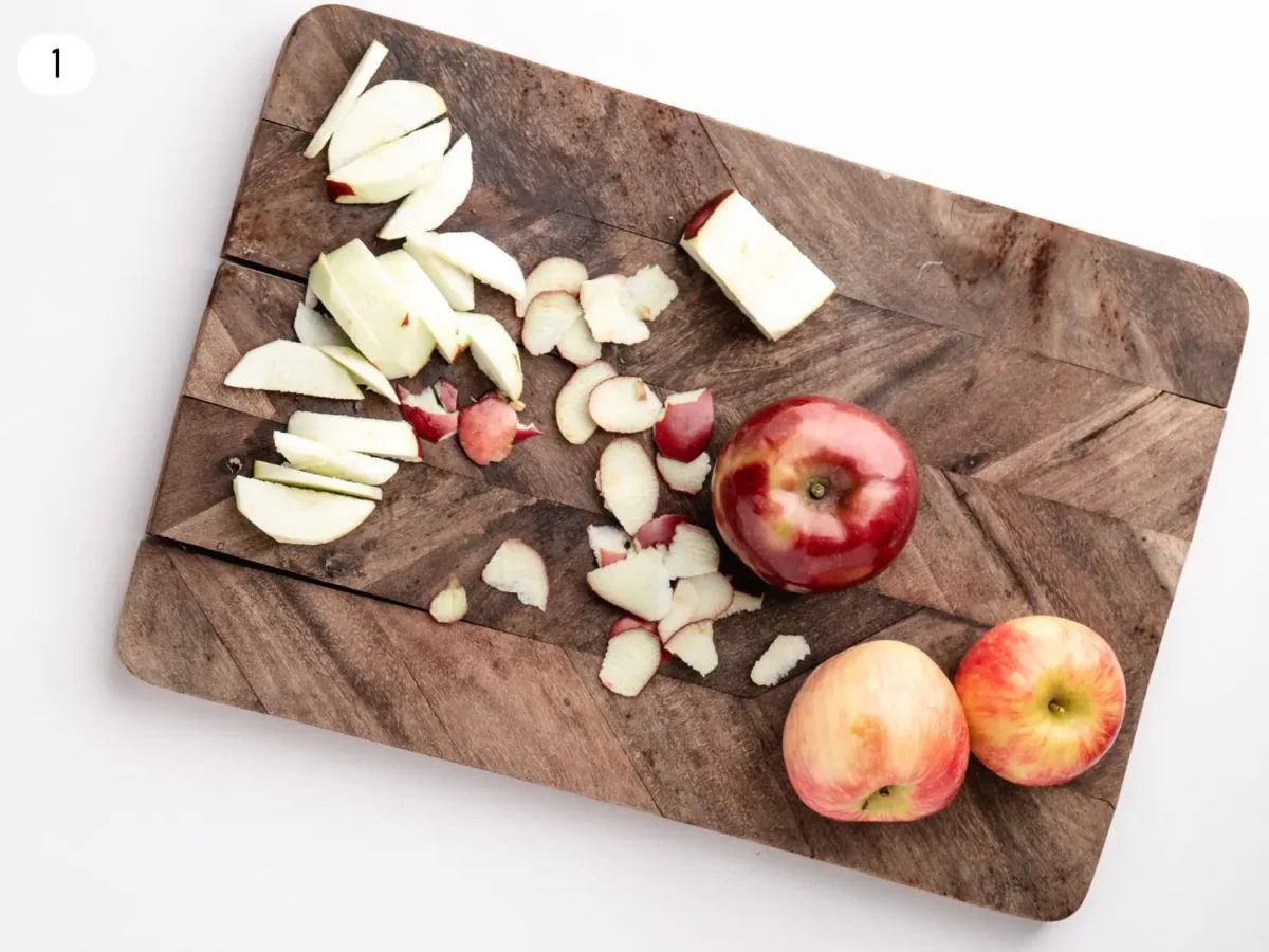 step 1 photo showing apples being chopped