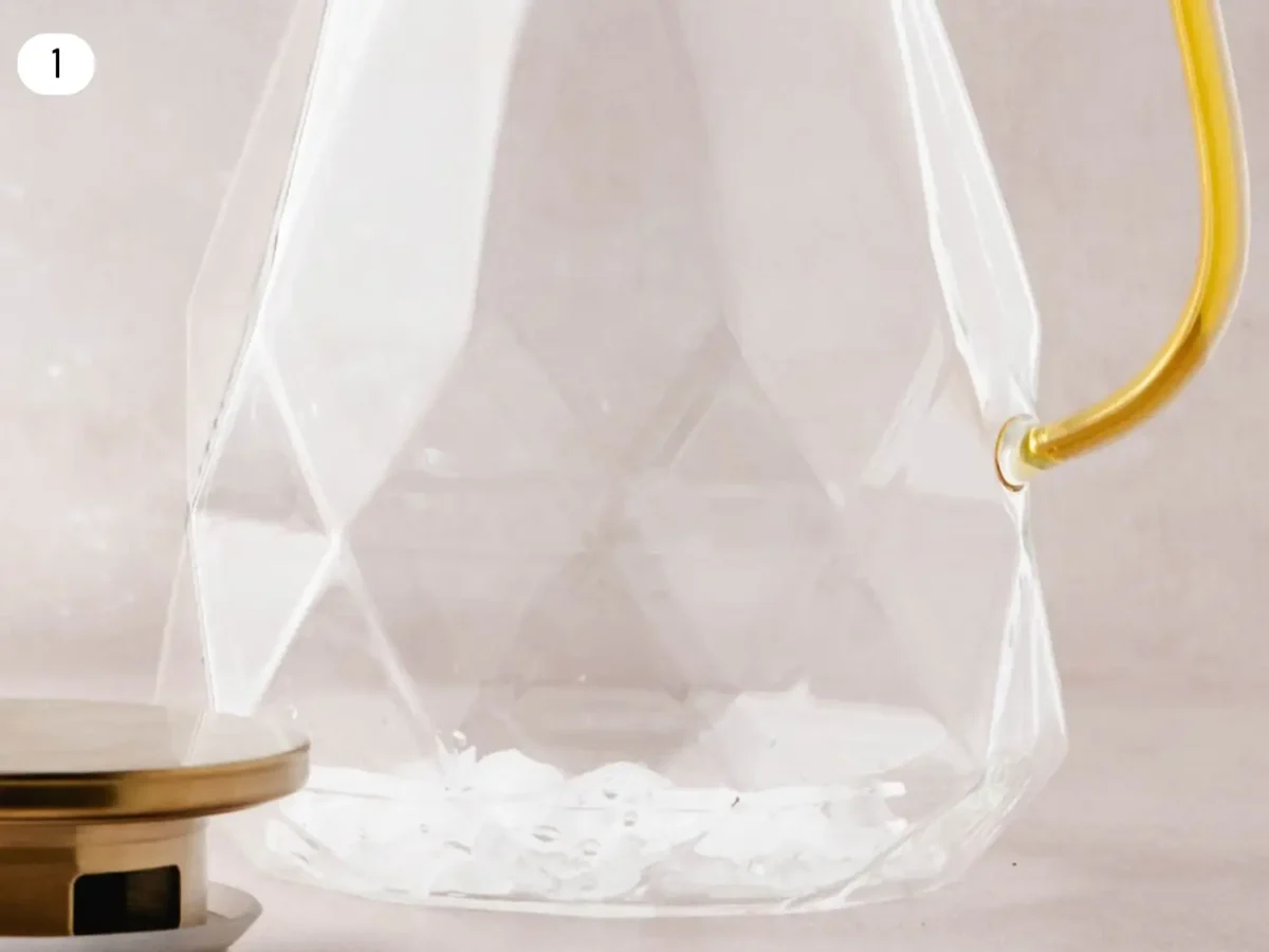 step 1 photo showing ice in a pitcher