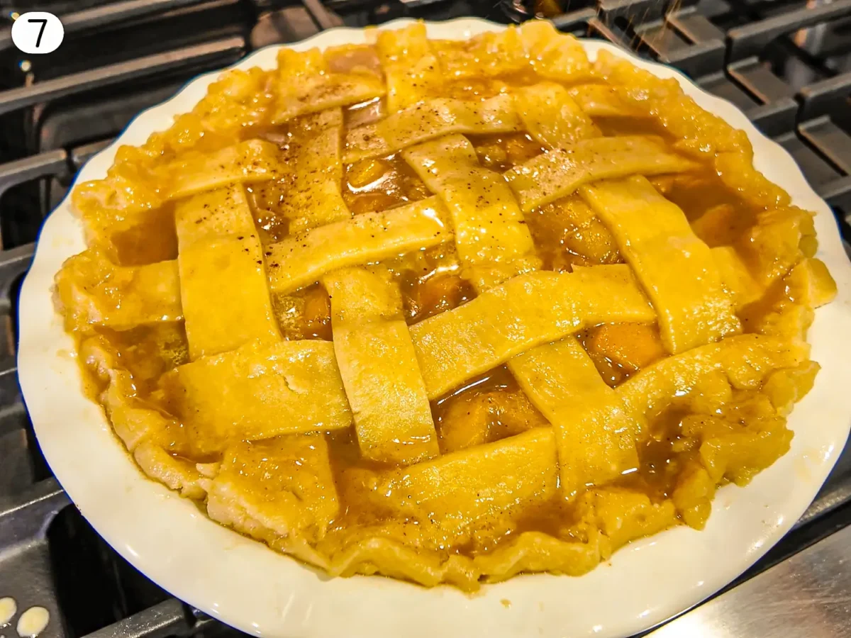 step 7 photo showing butter and cinnamon being sprinkled onto the pie