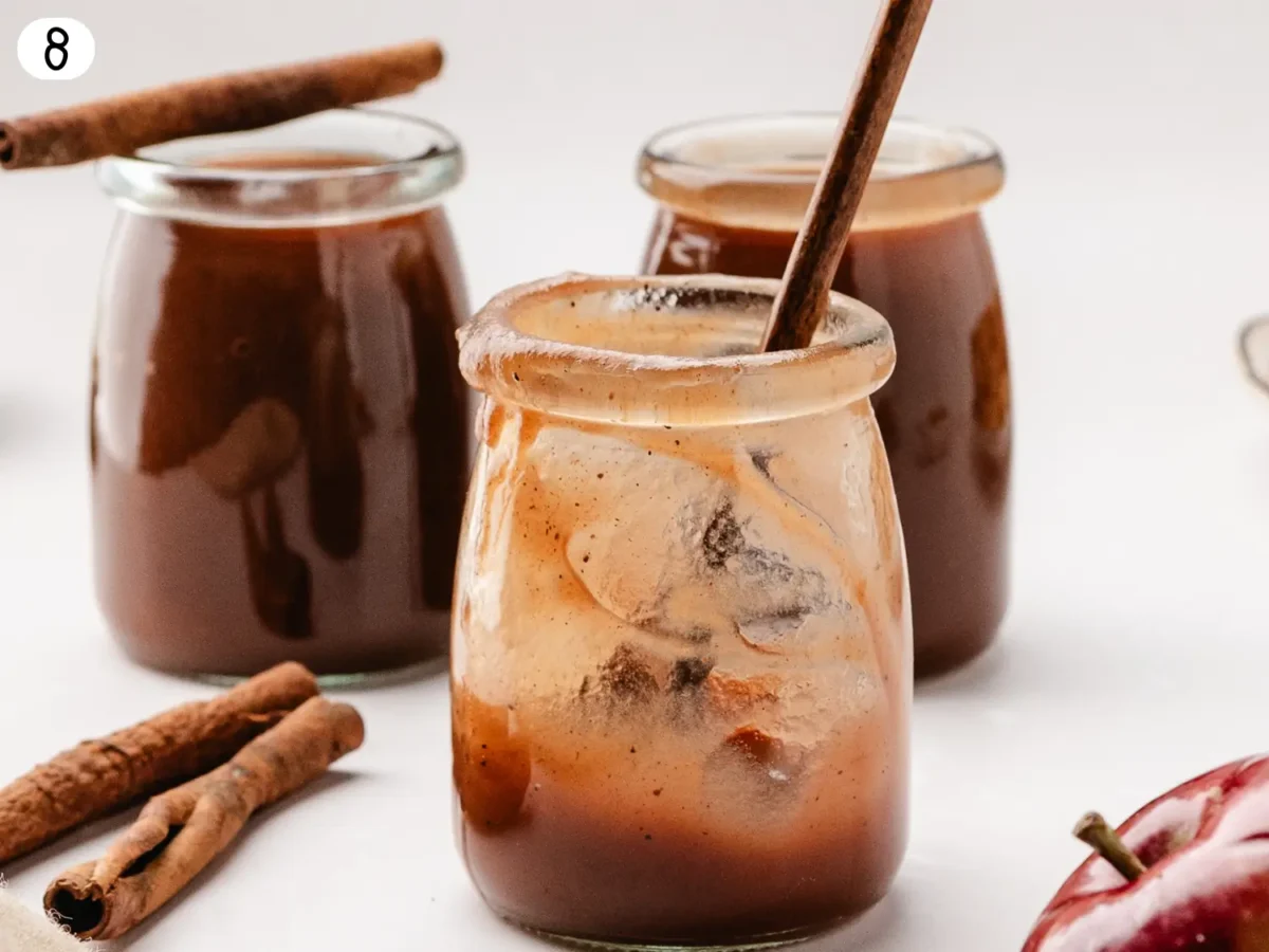 step 8 photo showing apple butter that's in glass jars