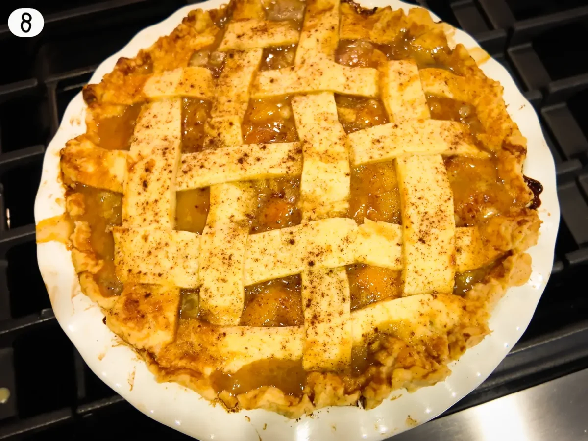 step 8 photo showing the peach pie after its fresh out of the oven resting